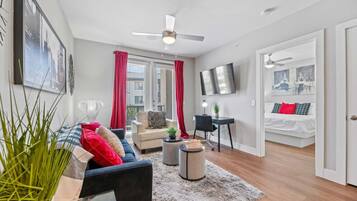 1 bedroom, desk, iron/ironing board, travel crib