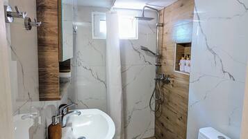 Shower, hair dryer, towels, soap