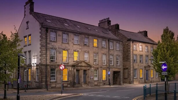 A historic building with multiple stories, large windows, and a prominent entrance. - Student Only Cable Street (Lancaster)