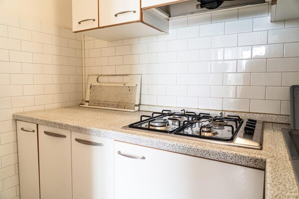 Fridge, microwave, highchair, cookware/dishes/utensils