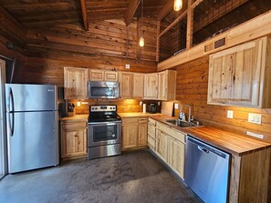 Cabin, Partial Lake View | Private kitchen - Lakefront Cabin in Prattville (Canyondam)