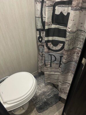 Shower, towels, soap, shampoo