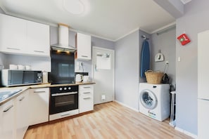 Fridge, microwave, toaster, cookware/dishes/utensils