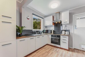 Fridge, microwave, toaster, cookware/dishes/utensils