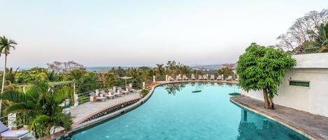 Outdoor pool, pool umbrellas, sun loungers