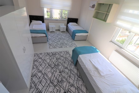 Basic Triple Room, Balcony, City View | 1 bedroom, desk, laptop workspace, free WiFi