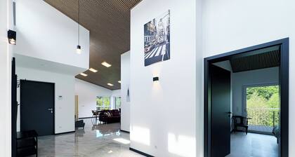 Luxurious 4-room penthouse with jacuzzi, roof terrace, parking space, e-charging station