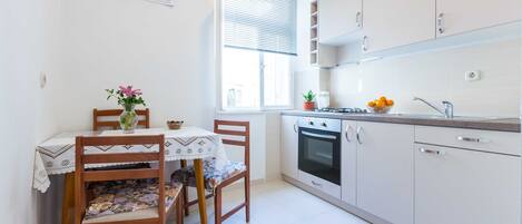 Fridge, oven, stovetop, high chair