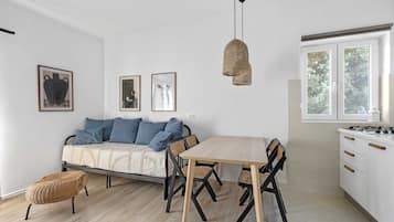 Apartment (One-Bedroom Apartment With Pool) | Living room | 32-inch flat-screen TV with cable channels