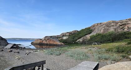 Cottage in beautiful rocky surroundings on Mjörn, only 300m from the sea | SE09115