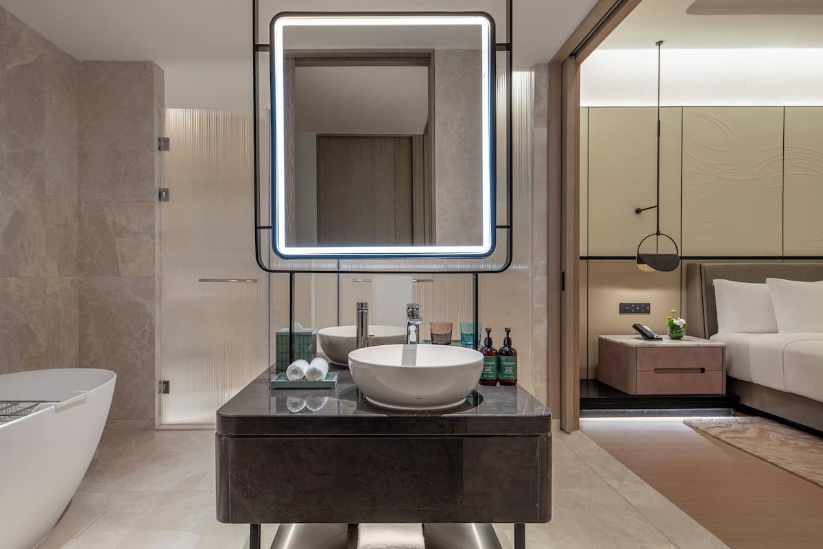 One Bedroom Suite | Down comforters, desk, laptop workspace, blackout drapes