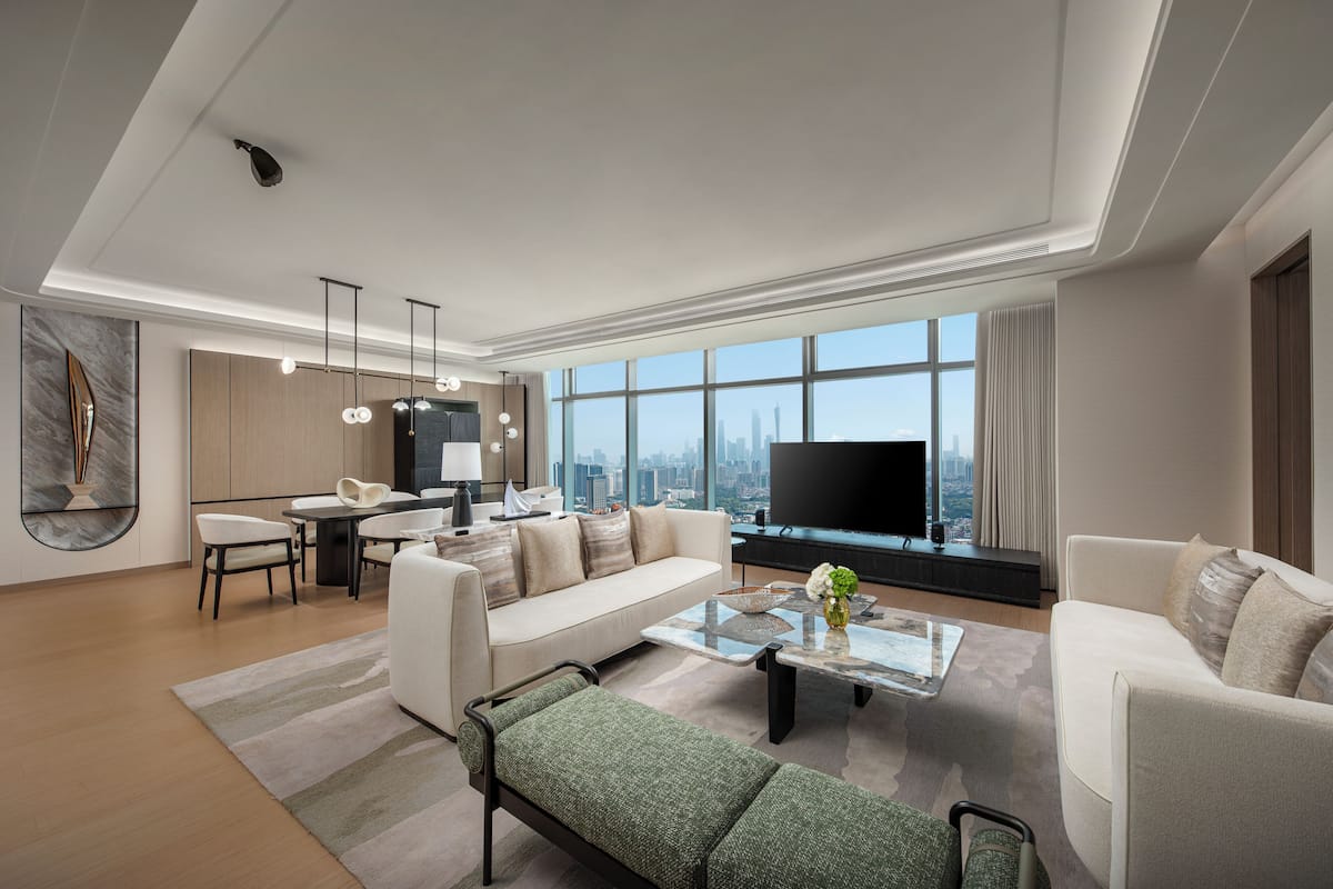 One Bedroom Suite Dining Area | Down comforters, desk, laptop workspace, blackout drapes