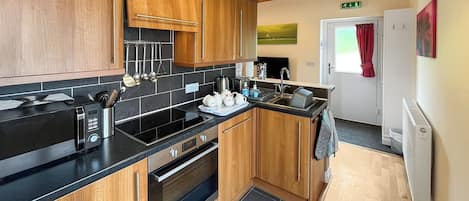 Dishwasher, high chair, cookware/dishes/utensils