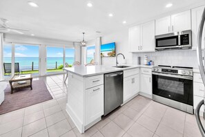 Maison mitoyenne, 1 très grand lit et 1 canapé-lit (Blue Mountain Beach Villas 5B) | Cuisine privée