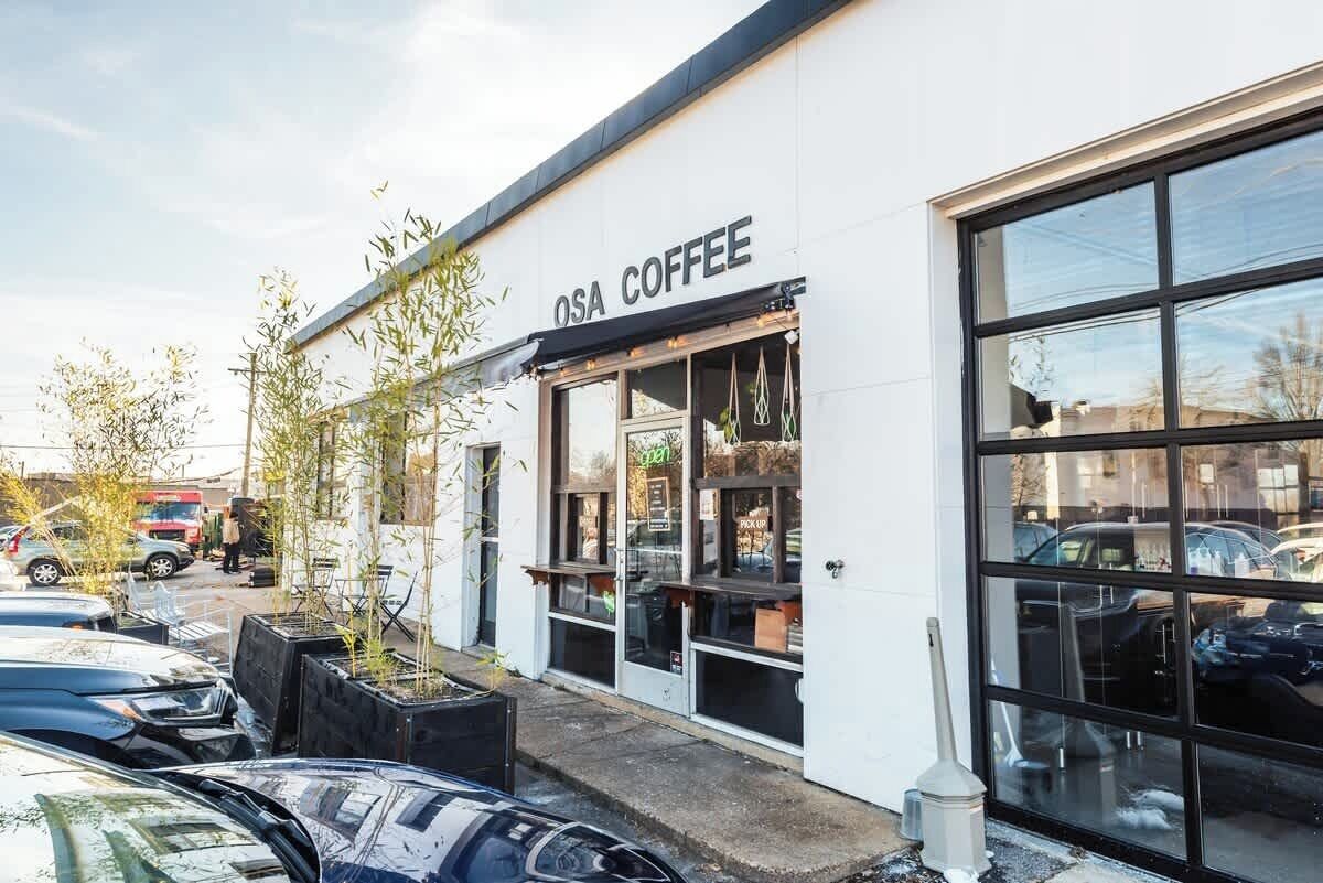 A coffee shop named OSA COFFEE with a storefront and large windows.