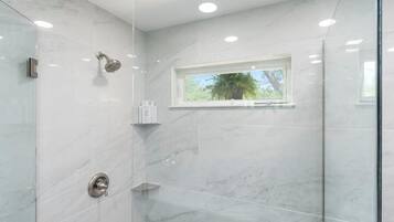 Shower, eco-friendly toiletries, hair dryer, towels