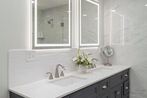 Shower, eco-friendly toiletries, hair dryer, towels