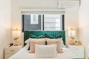 2 bedrooms, desk, iron/ironing board, travel crib