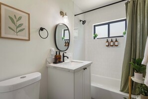 Shower, hair dryer, towels, shampoo