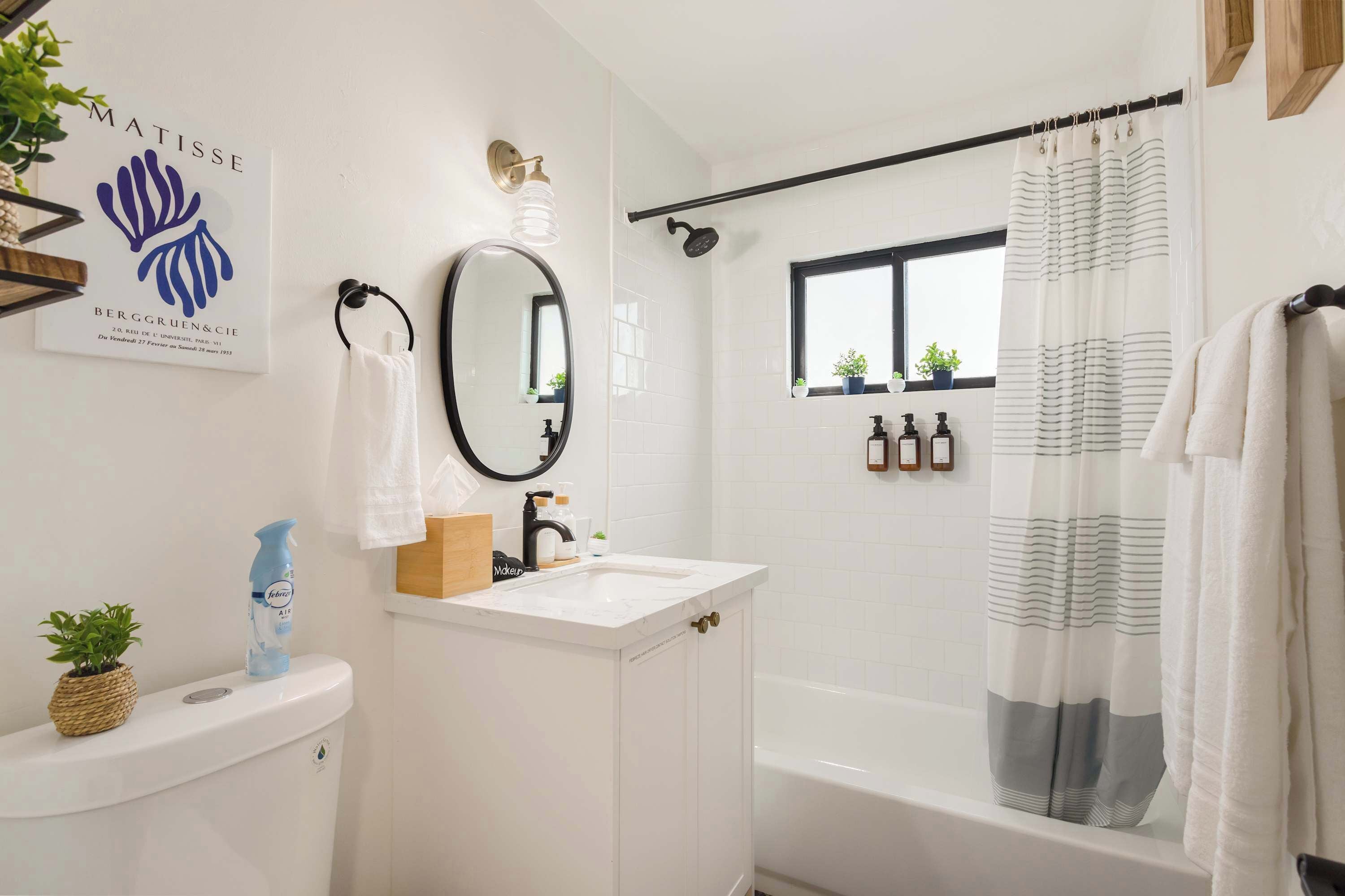 Shower, hair dryer, towels, shampoo