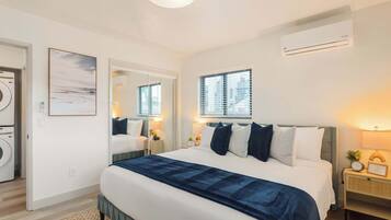 1 bedroom, desk, iron/ironing board, travel crib