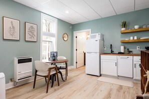 Fridge, coffee/tea maker, cookware/dishes/utensils