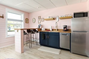 Fridge, microwave, coffee/tea maker, toaster