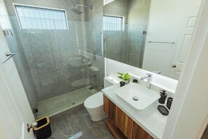 Shower, hair dryer, towels, soap