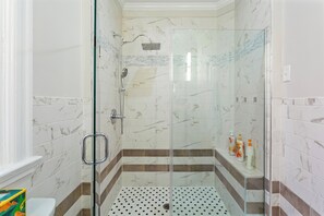 Shower, hair dryer, towels, soap