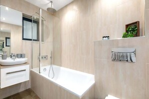 Shower, hair dryer, shampoo