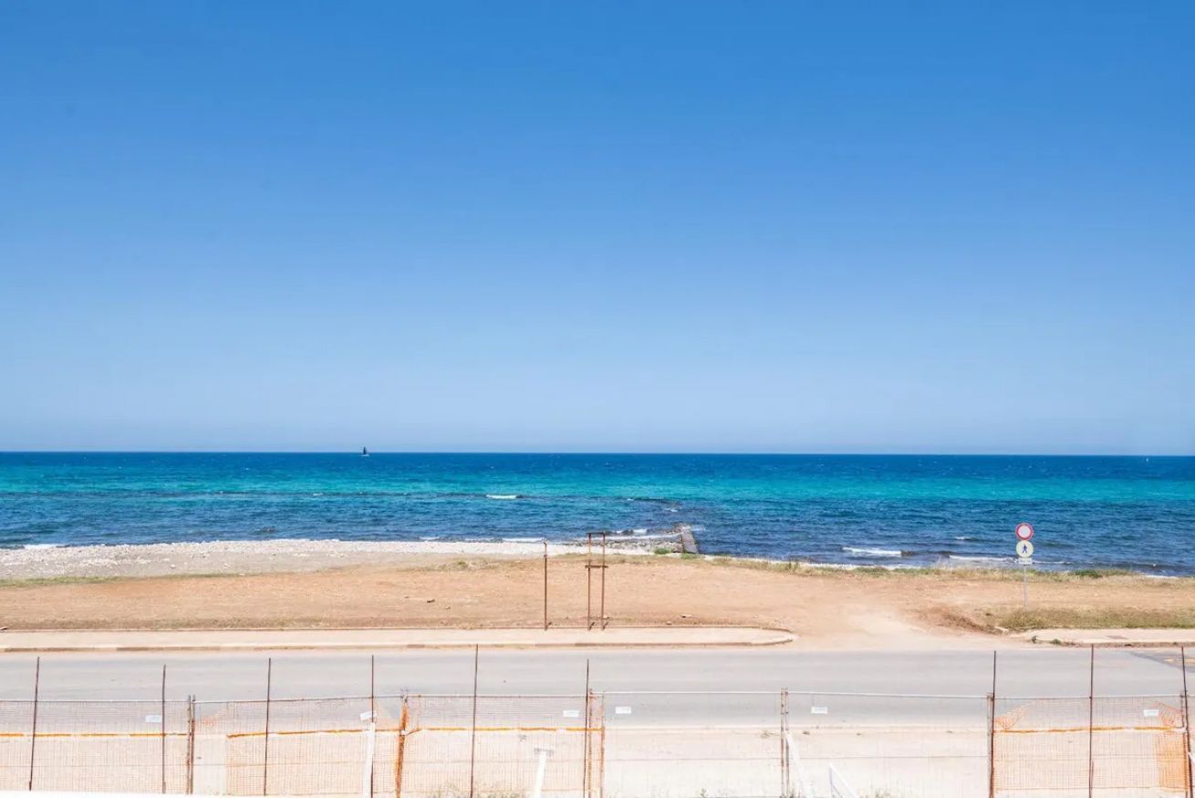 Una spiaggia nelle vicinanze, teli da spiaggia