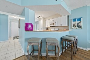 Fridge, microwave, oven, stovetop - Direct oceanfront 2/2 corner condo with large balcony, heated pool, and garage parking (Ormond Beach)