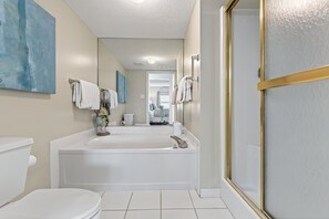 Shower, hair dryer, towels - Direct oceanfront 2/2 corner condo with large balcony, heated pool, and garage parking (Ormond Beach)