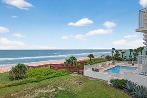 A heated pool - Direct oceanfront 2/2 corner condo with large balcony, heated pool, and garage parking (Ormond Beach)
