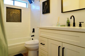 Hair dryer, towels, soap, shampoo
