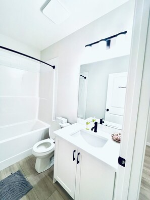 Hair dryer, towels, soap, toilet paper