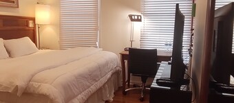 Guest Suite by Ameridency: 1 King Bed, 1 Bath with Rain Shower, Full Kitchen