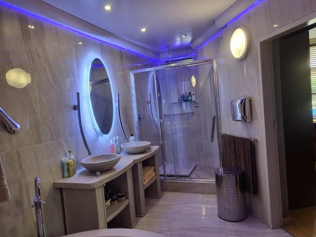 Shower, towels, soap, toilet paper