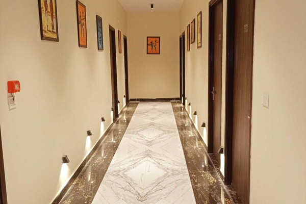 Deluxe Double Room | Living area | TV
