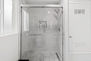 Shower, hair dryer, towels, soap