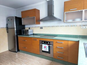 Fridge, microwave, coffee/tea maker, toaster