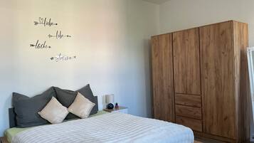 2 dormitorios, tabla de planchar con plancha, wifi gratis y ropa de cama