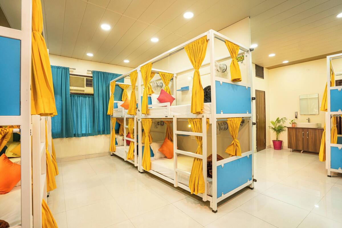 Bed in 12 Bed Mixed AC Dormitory Room with Ensuite Bathroom | WiFi (free)
