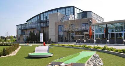Relax by the Outdoor Pool, Play Mini Golf, and Enjoy Free Parking for Your Stay