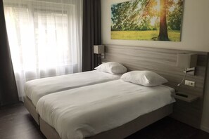 1 slaapkamer, een strijkplank/strijkijzer, gratis wifi, beddengoed