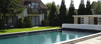 Free Parking Retreat with Pool, Terrace Dining & Scenic Bicycle Trails Nearby