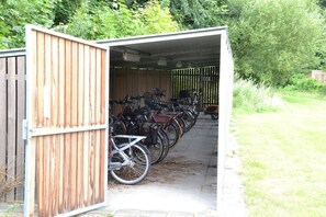 Bicycles are stored securely in this covered area.