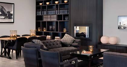 Modern Stay with Parking, Dining & Easy Airport Walk!