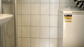 EstĂșdio conforto, vista para a cidade | Banheiro