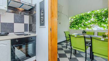 Standard Apartment, Balcony, Garden View | Terrace/patio